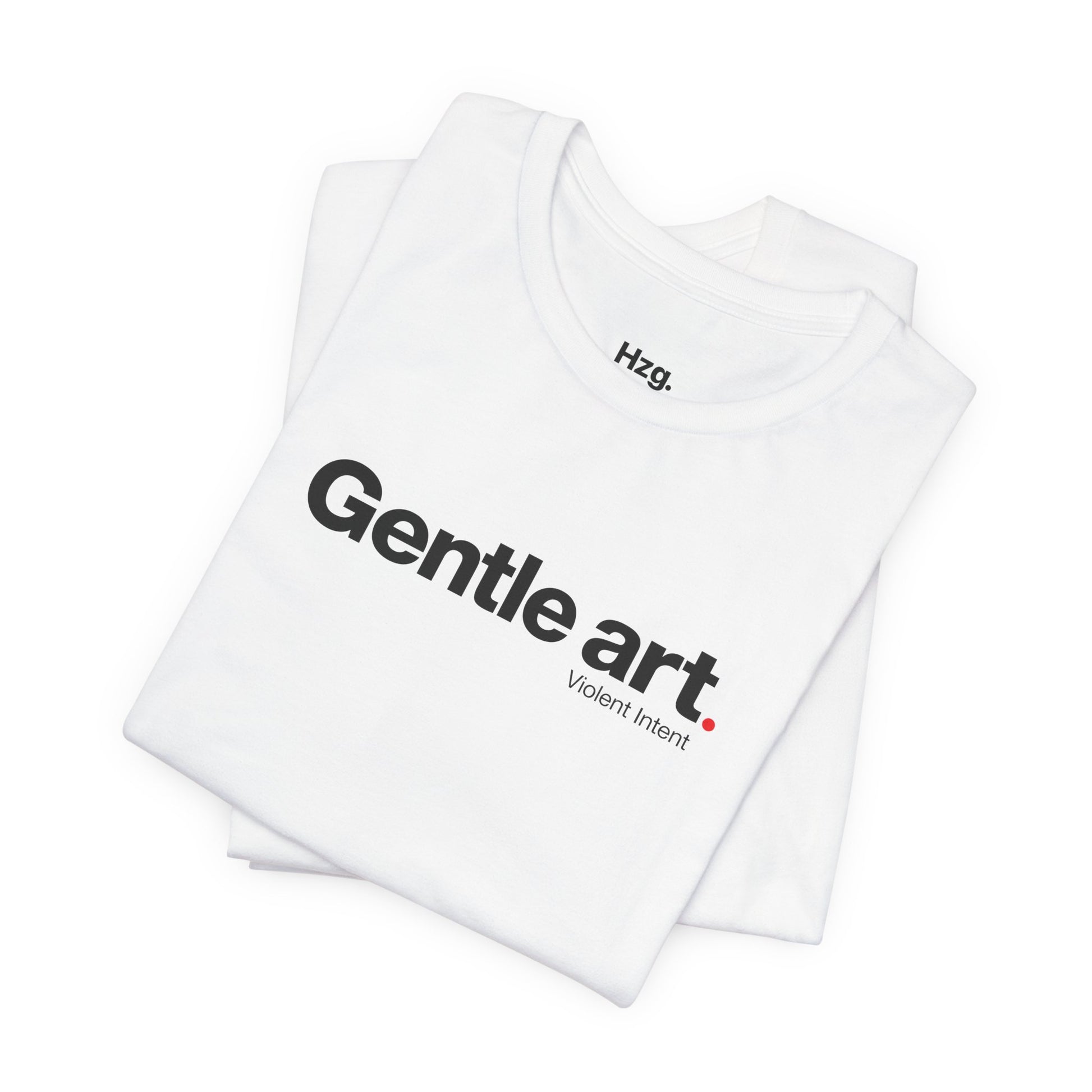 White t-shirt with 'Gentle art. Violent Intent' text on a white background
