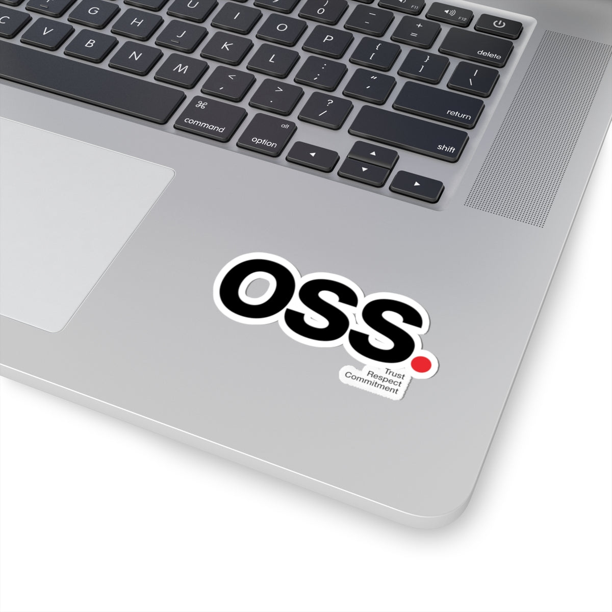 Laptop with an 'OSS' sticker on the palm rest area