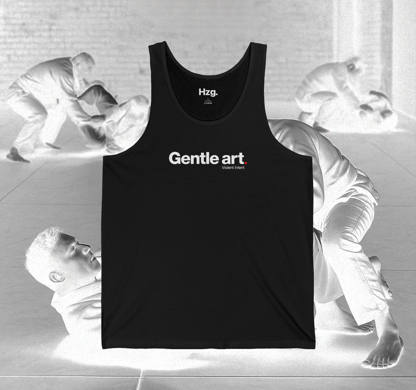 Black tank top with 'Gentle art' text on a gray background with abstract figures.