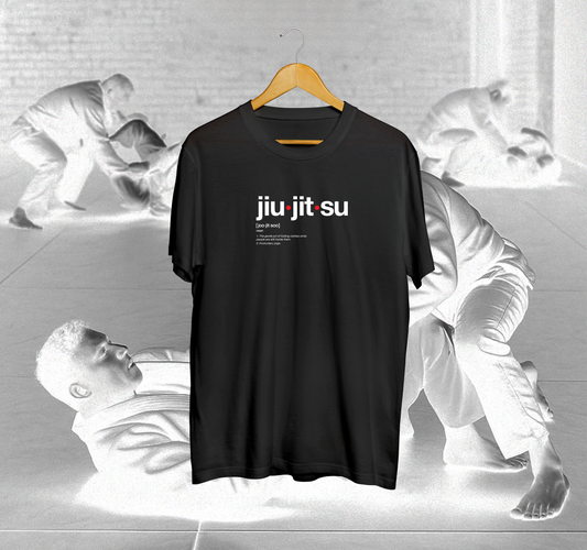 Black t-shirt with 'jiu jitsu' text on a hanger against a background of martial arts action.