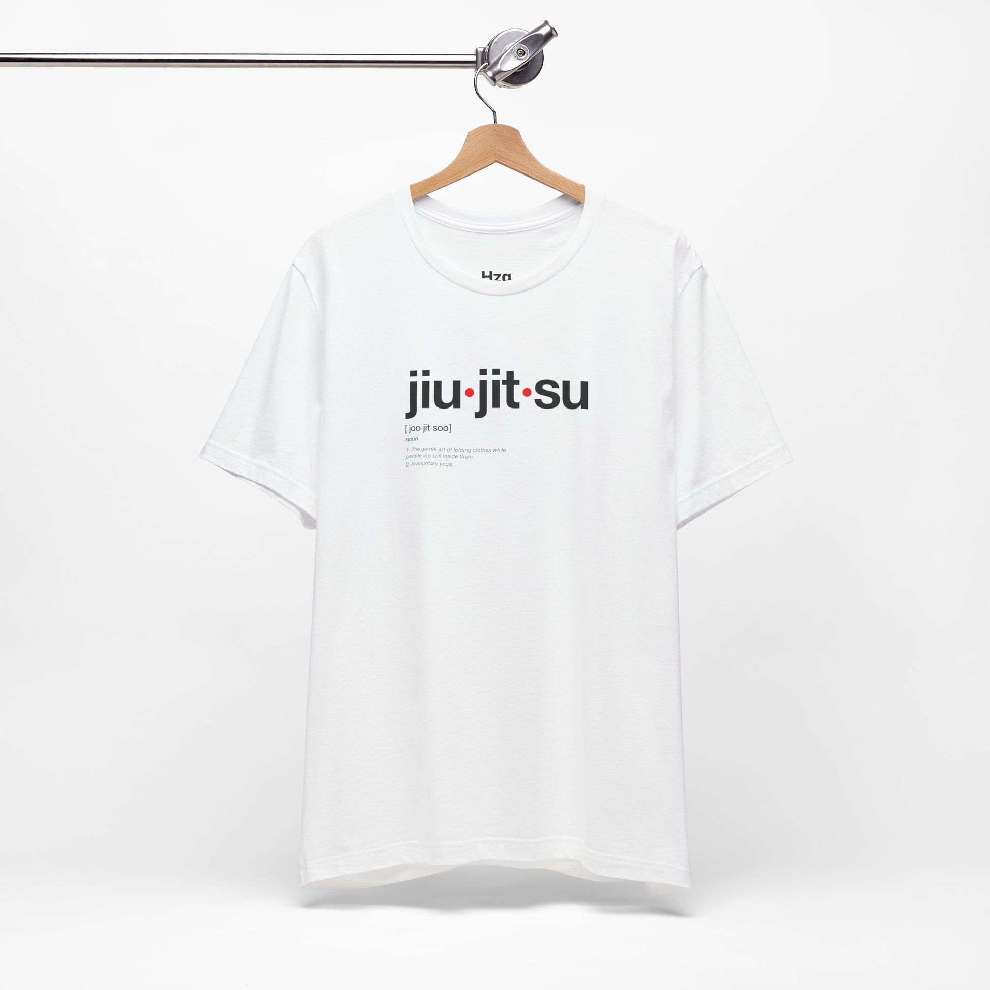 White t-shirt with 'jiu-jitsu' text on a hanger against a white background