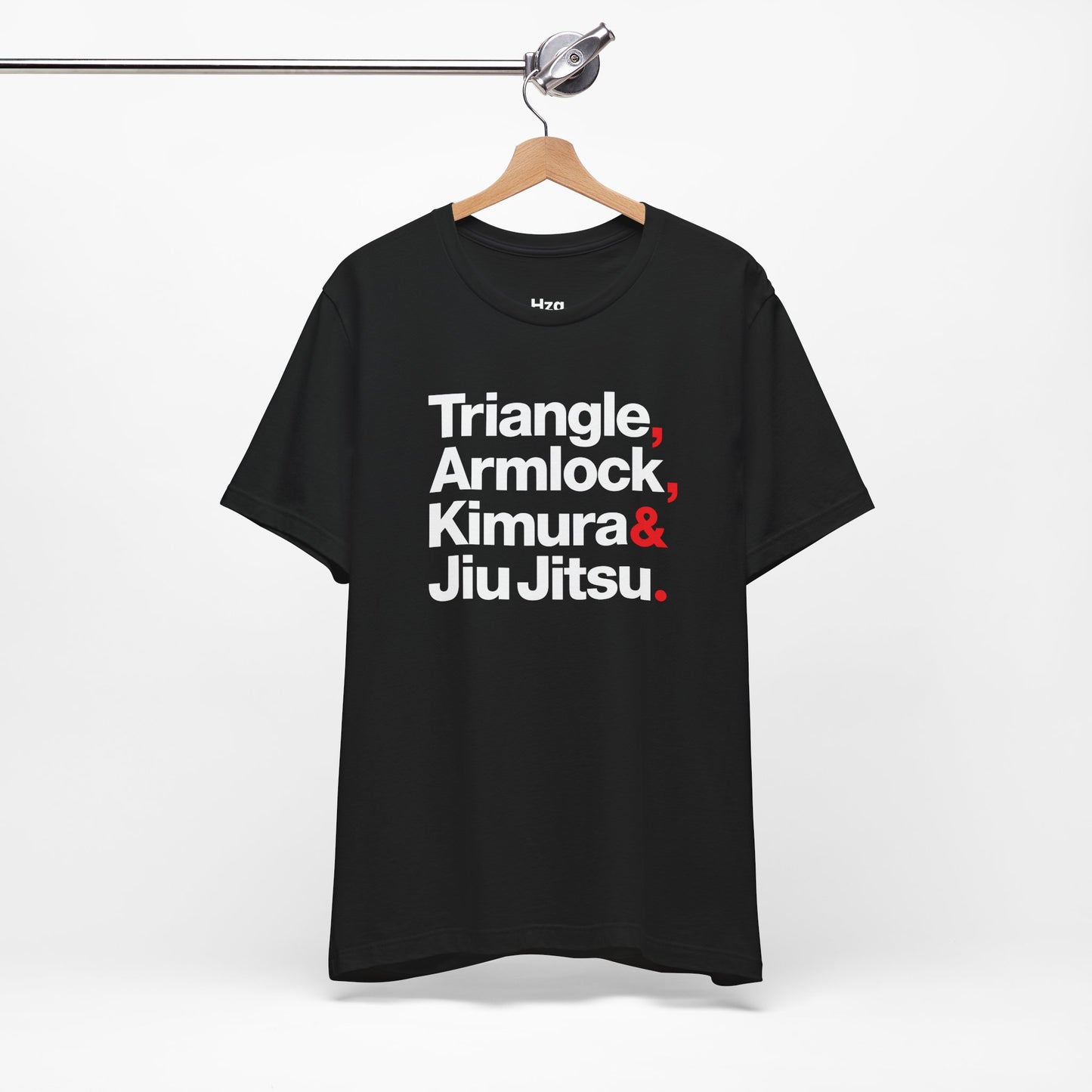 Black t-shirt with white and red text on a hanger against a white background